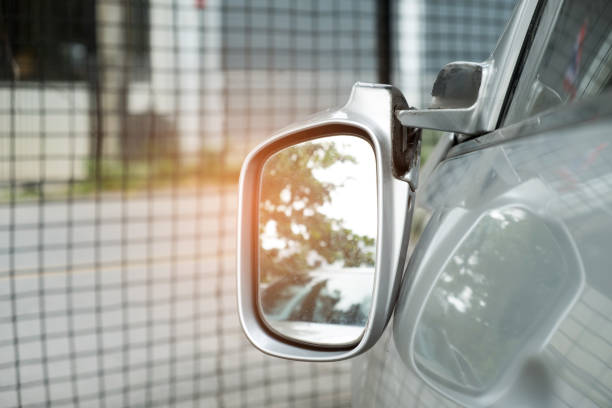 istock Car accident,Blonde car with a broken rearview mirror. 900115884