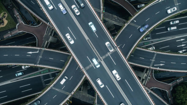 istock Highway junction aerial view on a cloudy day 900118752