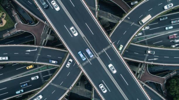 istock Highway junction aerial view on a cloudy day 900118756