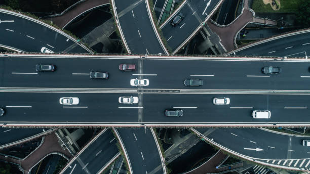 istock Highway junction aerial view on a cloudy day 900118764