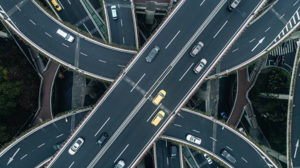 istock Highway junction aerial view on a cloudy day 900118780