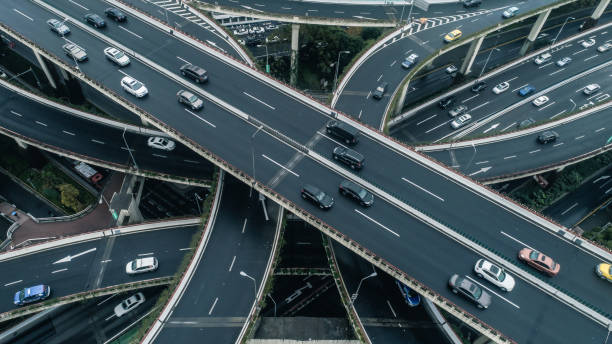 istock Highway junction aerial view on a cloudy day 900118800