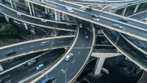 istock Highway junction aerial view on a cloudy day 900118808