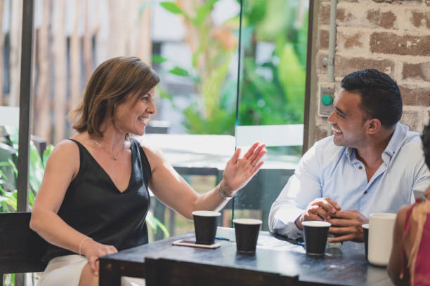 istock Diverse group of friends at cafe 900118880