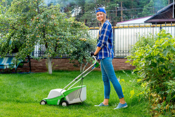 istock Young woman gardening 900119348