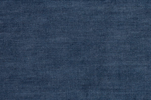 istock Texture of blue denim jeans background 900131120