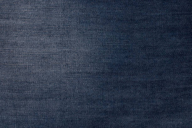 istock Texture of blue denim jeans background 900134616