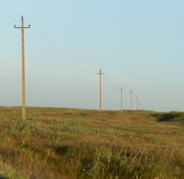 istock power poles in the sunset 900164116