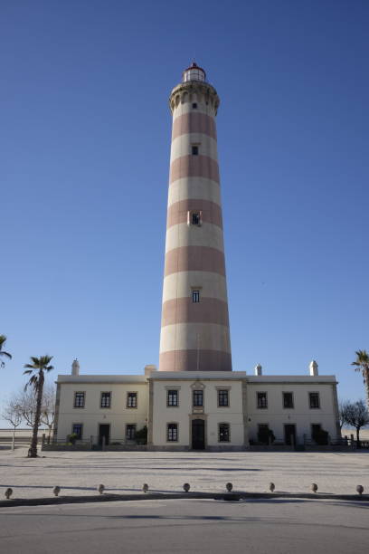 istock barra lighthouse in portugal 900165084
