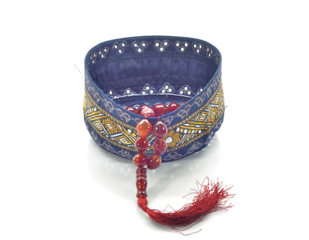 istock kopiah and tasbih 900173524
