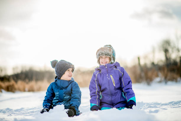 istock Siblings On A Winter Day 900180684