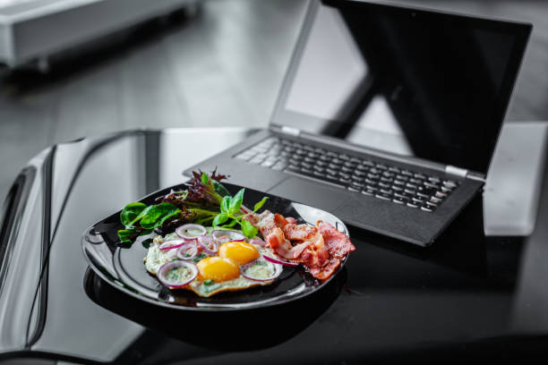 istock Meal and laptop. 900188856