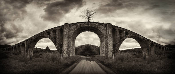 istock Stylized black and white photo of an old bridge 900191782