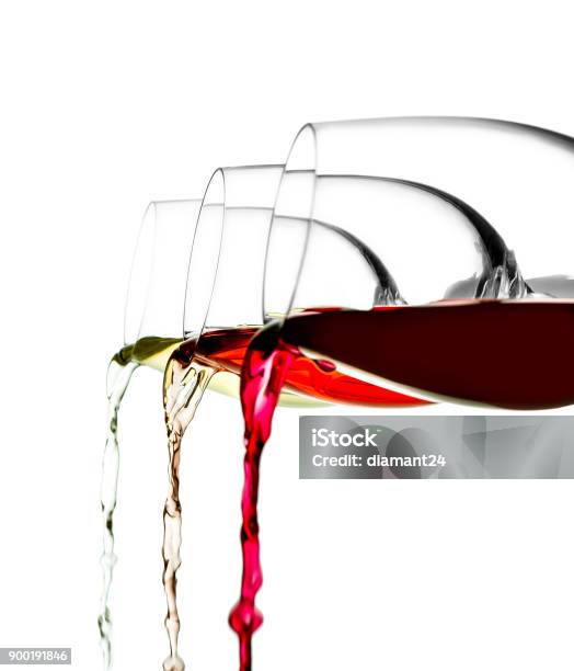 Three Glasses Of Red White And Pink Wine Are Poured Isolated Stock Photo - Download Image Now