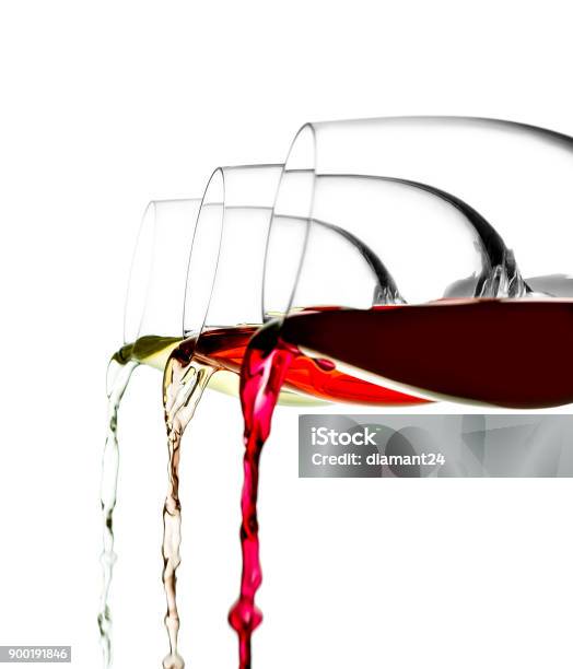 Foto de Três Copos De Vermelho Branco E Rosa São Vinho Derramaram Isolado e mais fotos de stock de Vinho