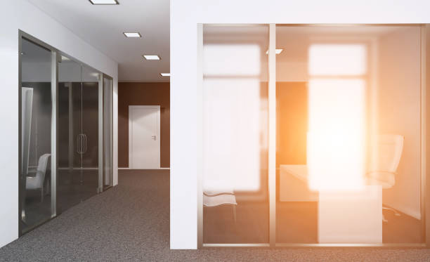 istock Open space office interior with like conference room. Mockup. 3D rendering. Sunset. 900192840