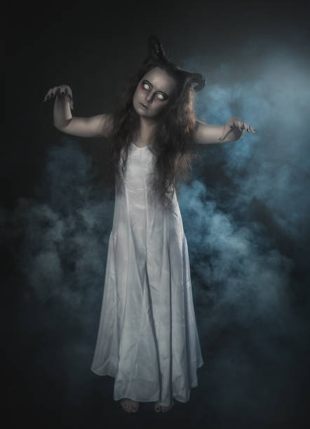 istock Terrible ghost with horns on fog background 900193006