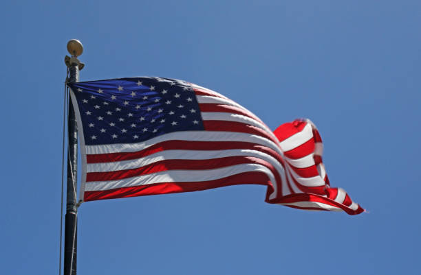 istock American flag waving in the wind 900196268