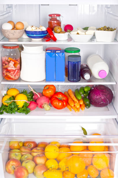 istock vegetables and foods inside refrigerator 900200304