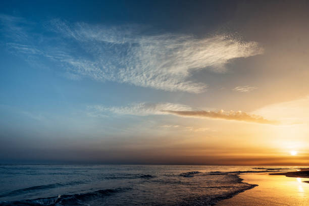 istock Beautiful beach in the sunset moment. 900209870