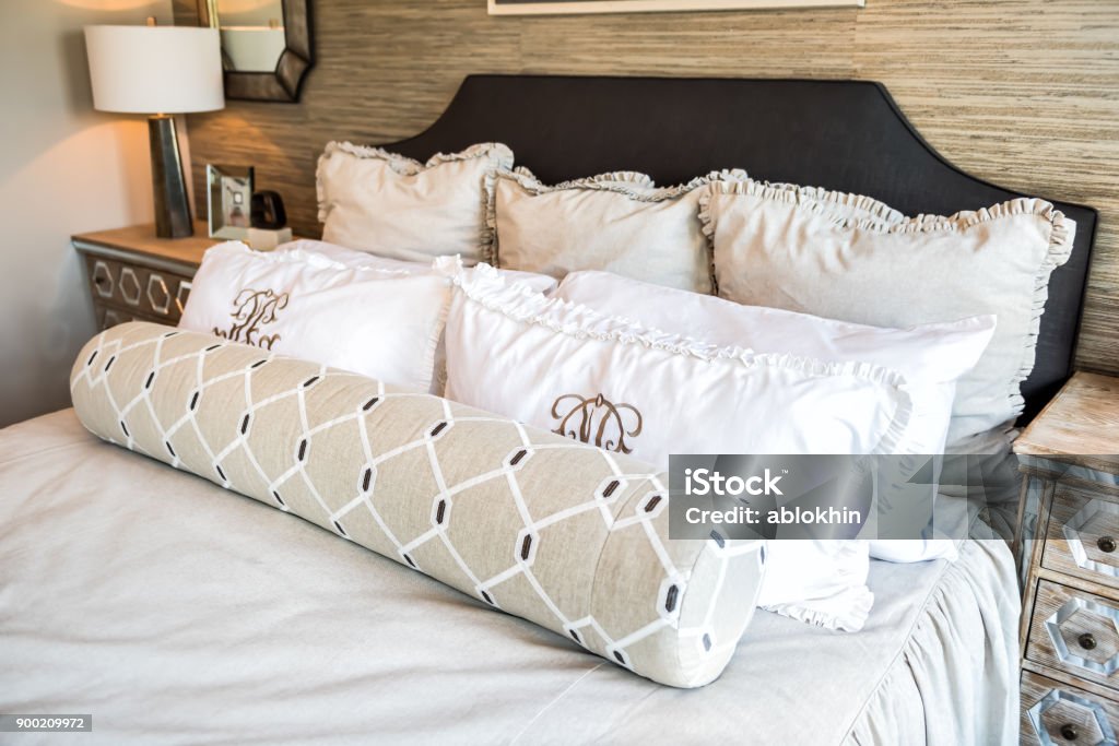 https://media.istockphoto.com/id/900209972/photo/closeup-of-new-bed-comforter-with-decorative-pillows-in-bedroom-in-staging-model-home.jpg?s=1024x1024&w=is&k=20&c=oauXHKjXEOMz0hjgi064XrrZc-68TzCSgjBptduCVCg=