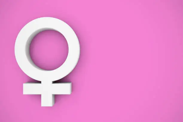 Female Symbol in white on a pink background with copy space for text