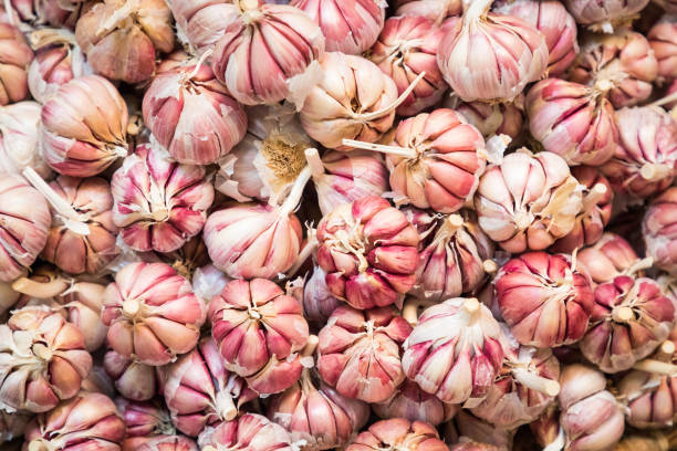 istock fresh garlics in a market 900224986