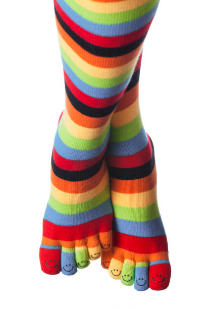istock Colored socks with smile fingers on a white background 900228752