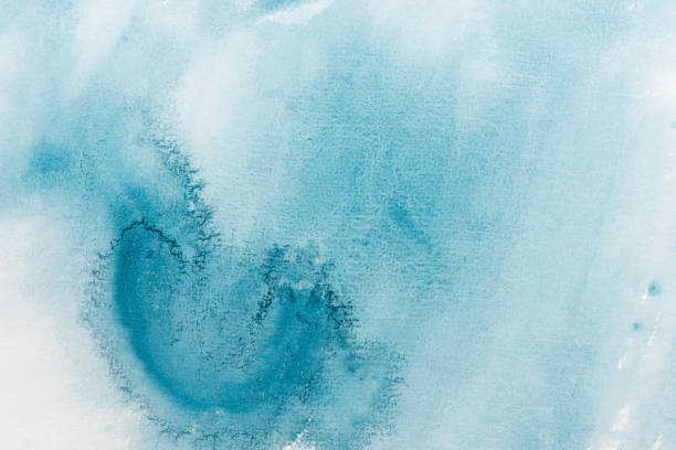 istock blue watercolor painting on white paper background texture 900239438