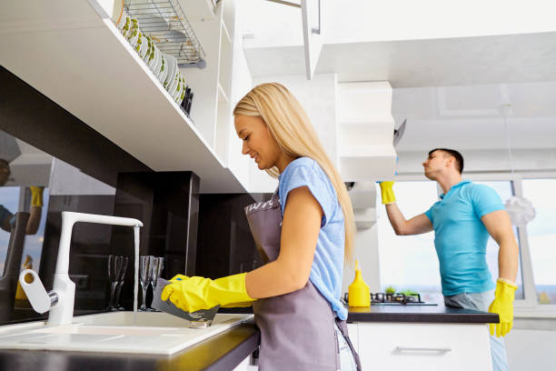 istock The couple is cleaning in the kitchen 900243332