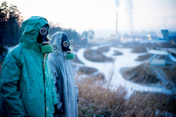 istock People in gas masks 900247250