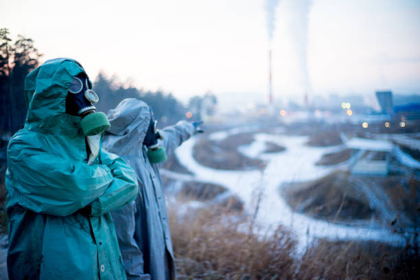 istock People in gas masks 900247550