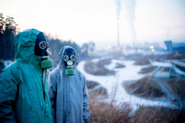 istock People in gas masks 900247800