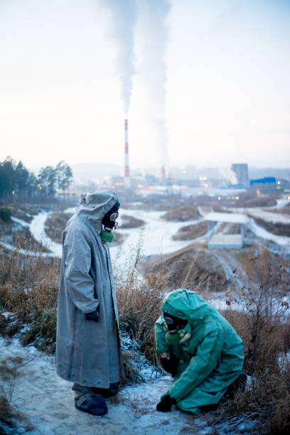 istock People in gas masks 900250064