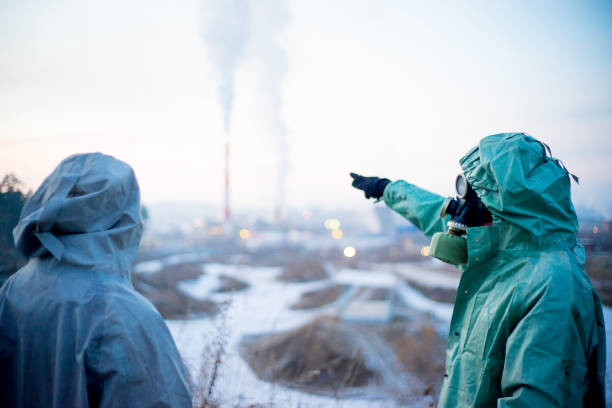 istock People in gas masks 900250960