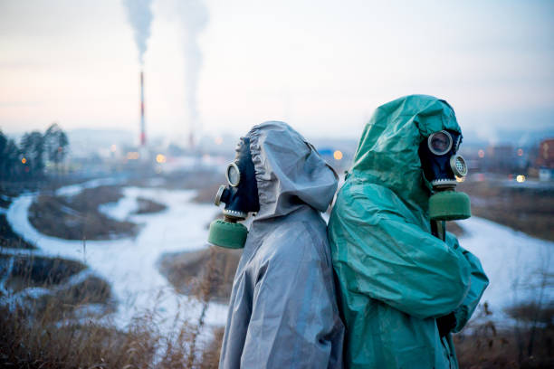 istock People in gas masks 900251078