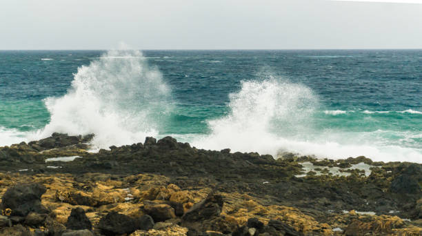 istock waves and spray at the coastline 900251302