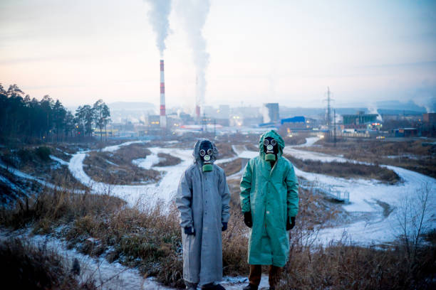 istock People in gas masks 900251710