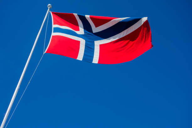 istock Flag of Norway flapping in wind. 900263092