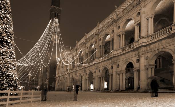 istock Vicenza in Italy Main square with snow and photograph old effect 900264108