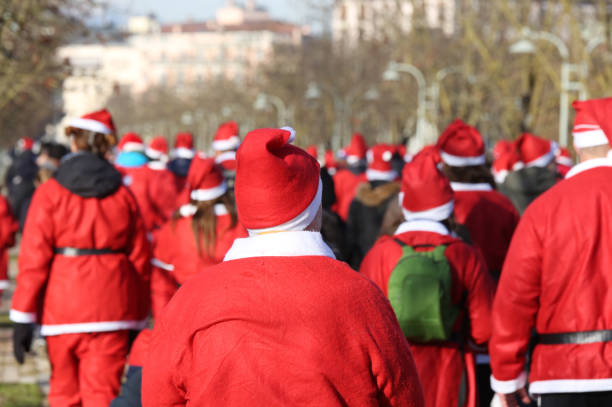 istock Many Santa Claus with red dress 900264380