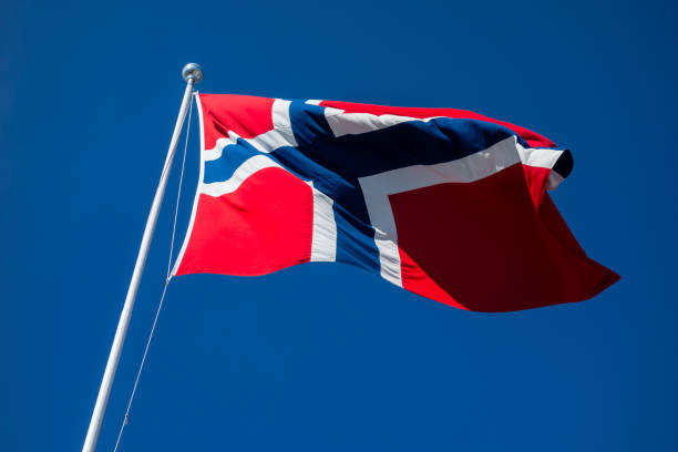 istock Flag of Norway flapping in wind. 900264448
