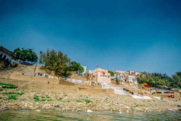 istock Ganges ghat in Varanasi, laundry drying by the river. 900275014
