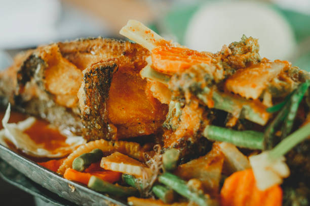 istock Steamed whole fish with sauce 900281968