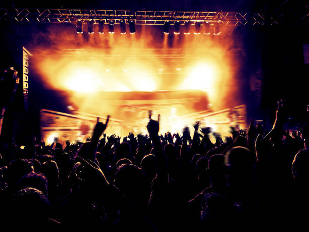 istock Colorful stage lights inside a venue 900288212