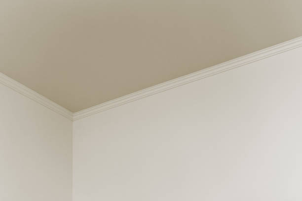 istock White walls and ceiling in the room as a background 900288218