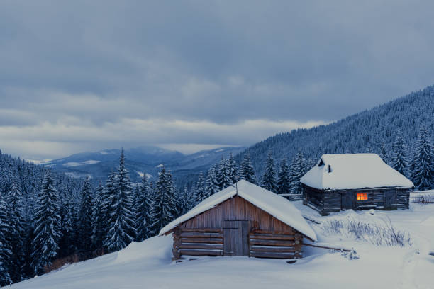 istock Fantastic landscape with snowy house 900295452