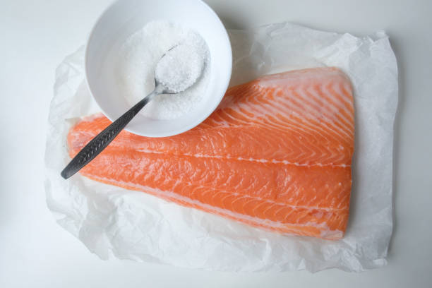 istock Fillet of salmon fish on white table 900298474