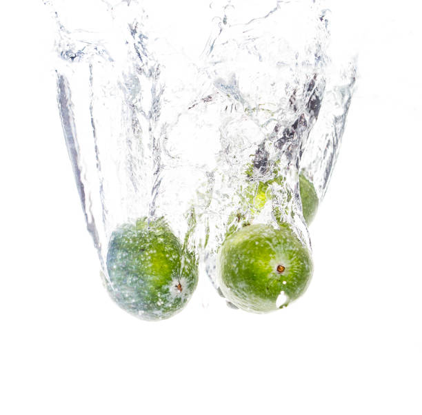 istock Feijoa under water on a white background 900306186
