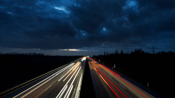 istock Traffic on highway - long exposure, motion blur 900310240